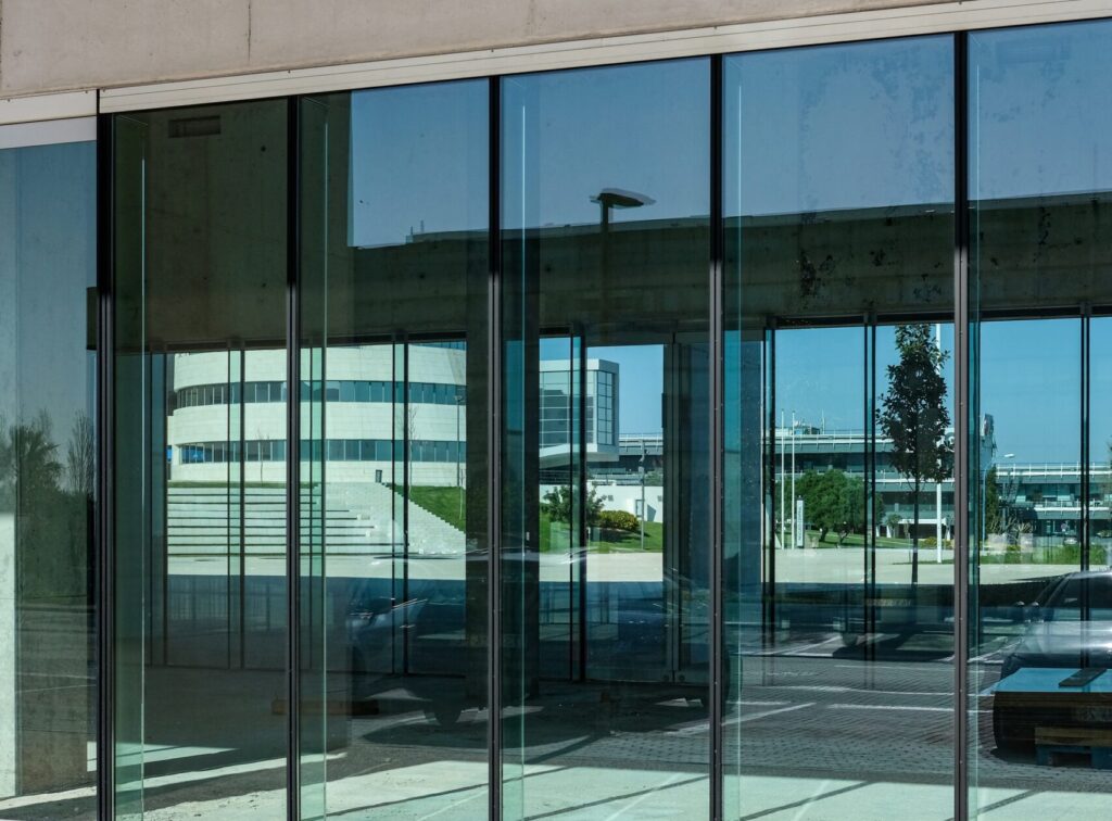 Windows Glass Repair Modern building with secure reinforced glass door in Toronto